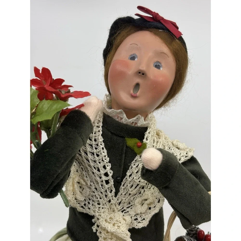 2009 Woman Selling Holiday Flowers By Buyers choice The Carolers